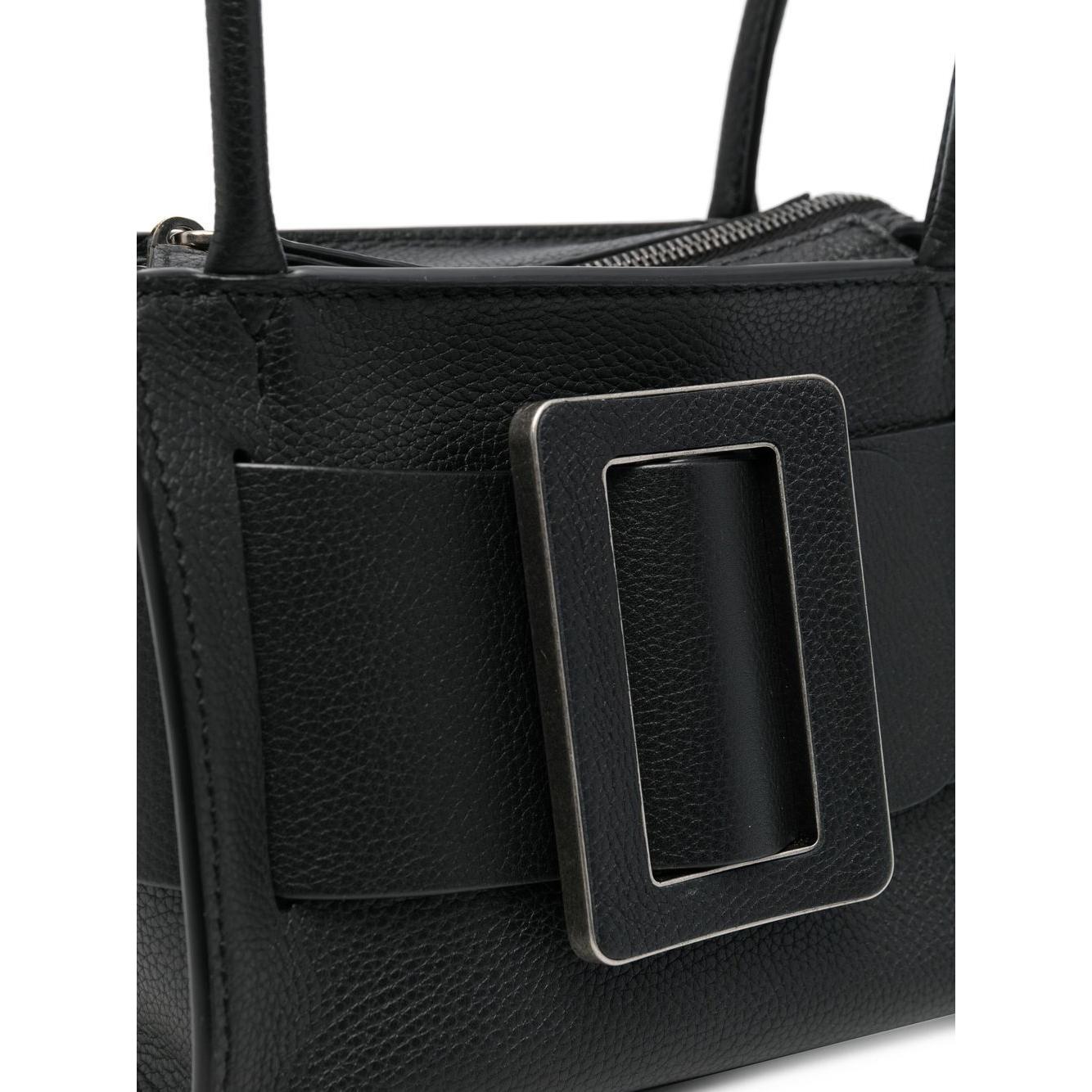 Front view with bag zipped and handles upright.