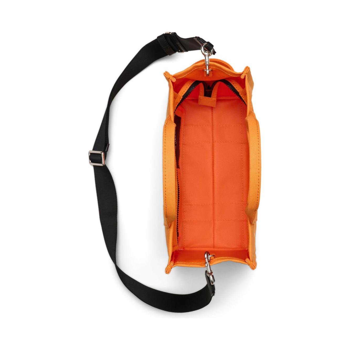 Front view with bag zipped and handles upright.