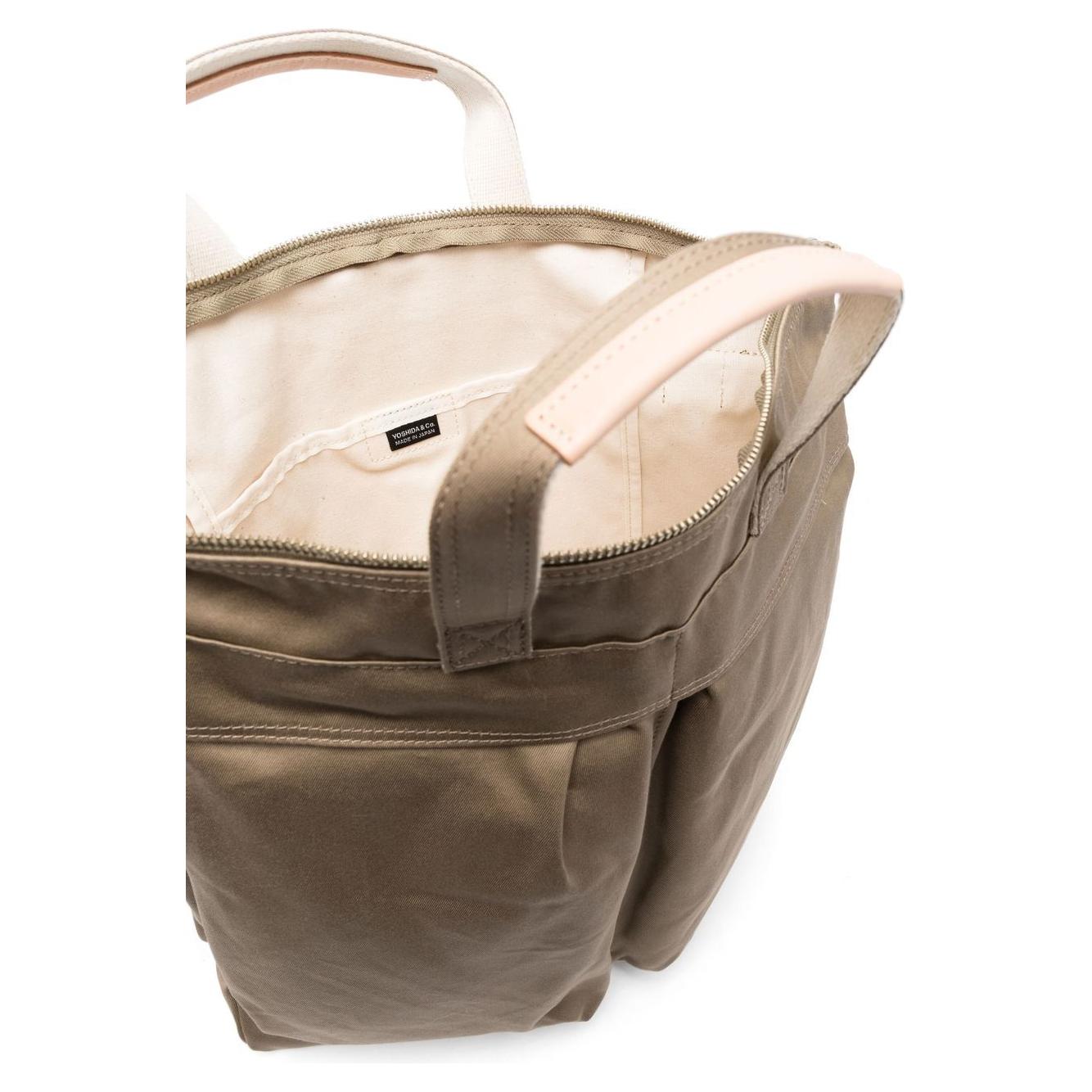 Front view with bag zipped and handles upright.