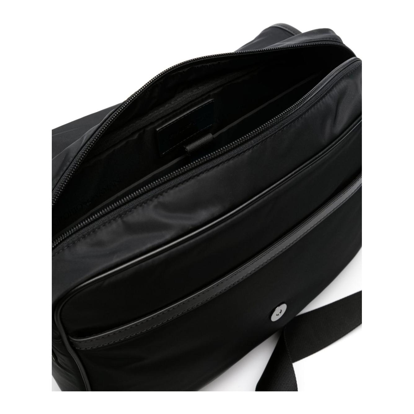 Front view with bag zipped and handles upright.