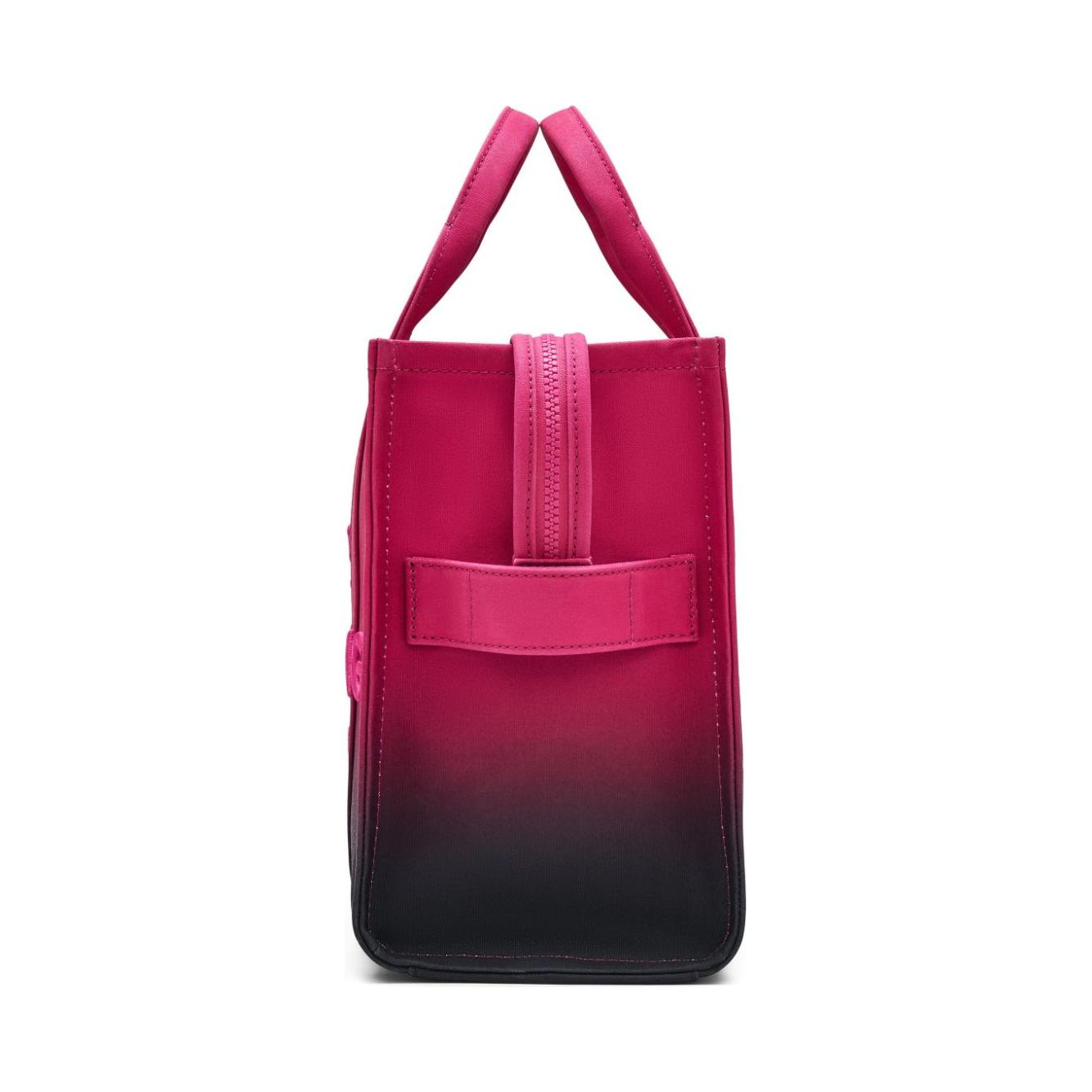 Front view with bag zipped and handles upright.