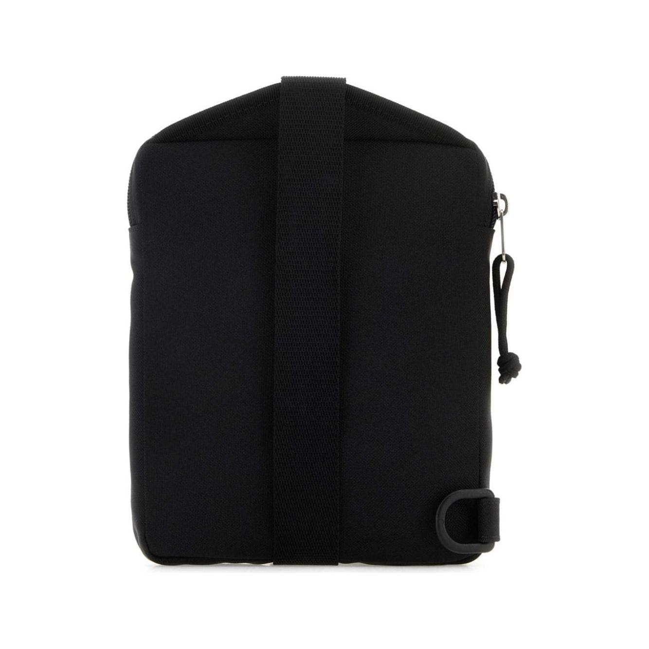 Front view with bag zipped and handles upright.