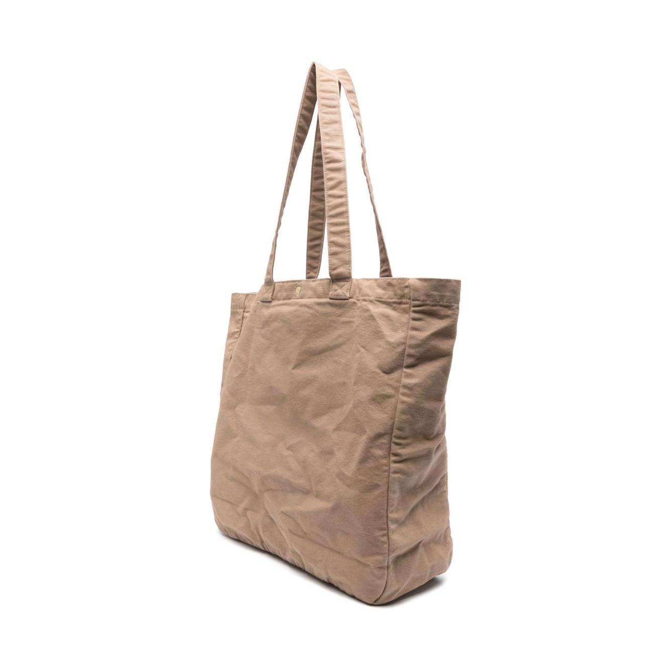 Front view with bag zipped and handles upright.