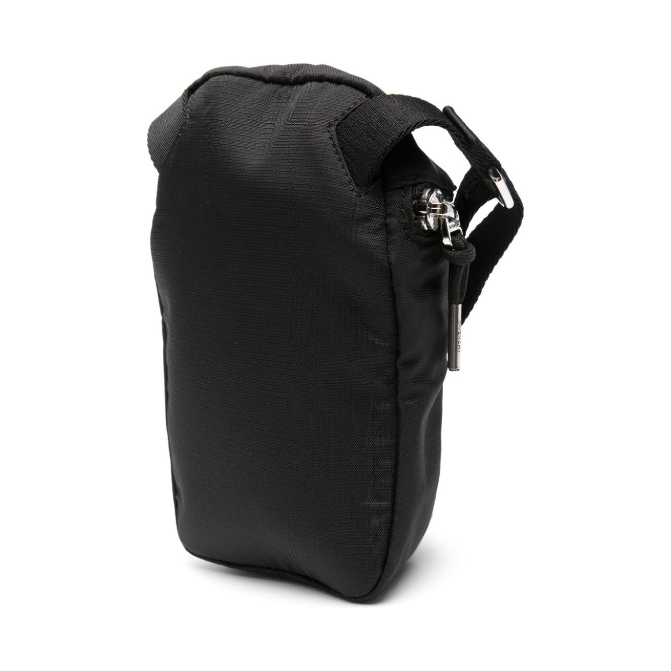 Front view with bag zipped and handles upright.