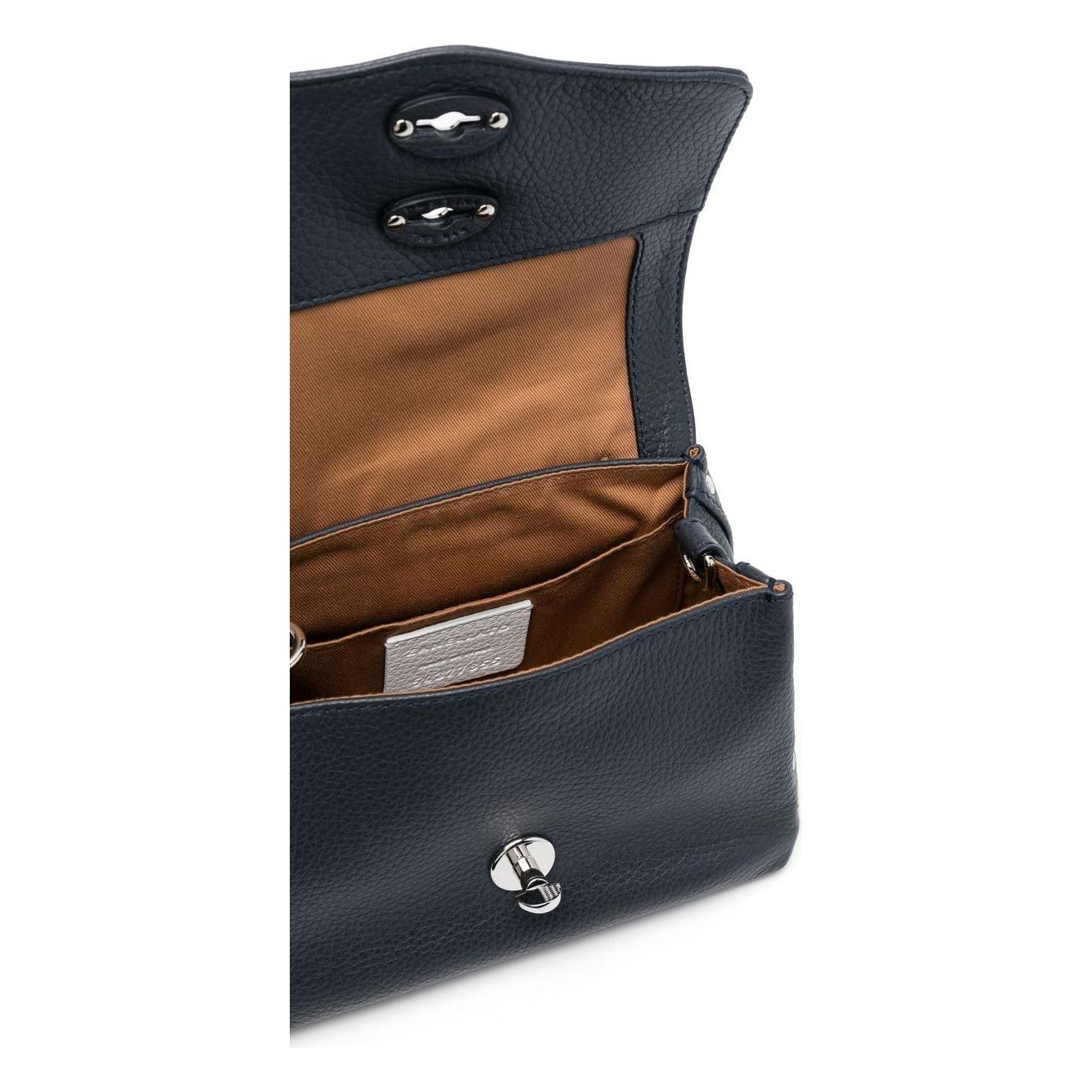 Front view with bag zipped and handles upright.