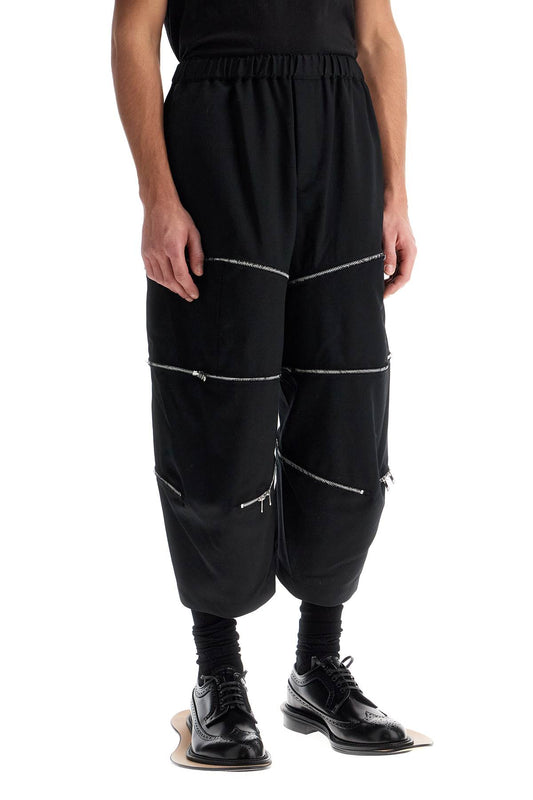 COMME DES GARCONS BLACK cropped pants with zip openings. Trousers COMME DES GARCONS BLACK