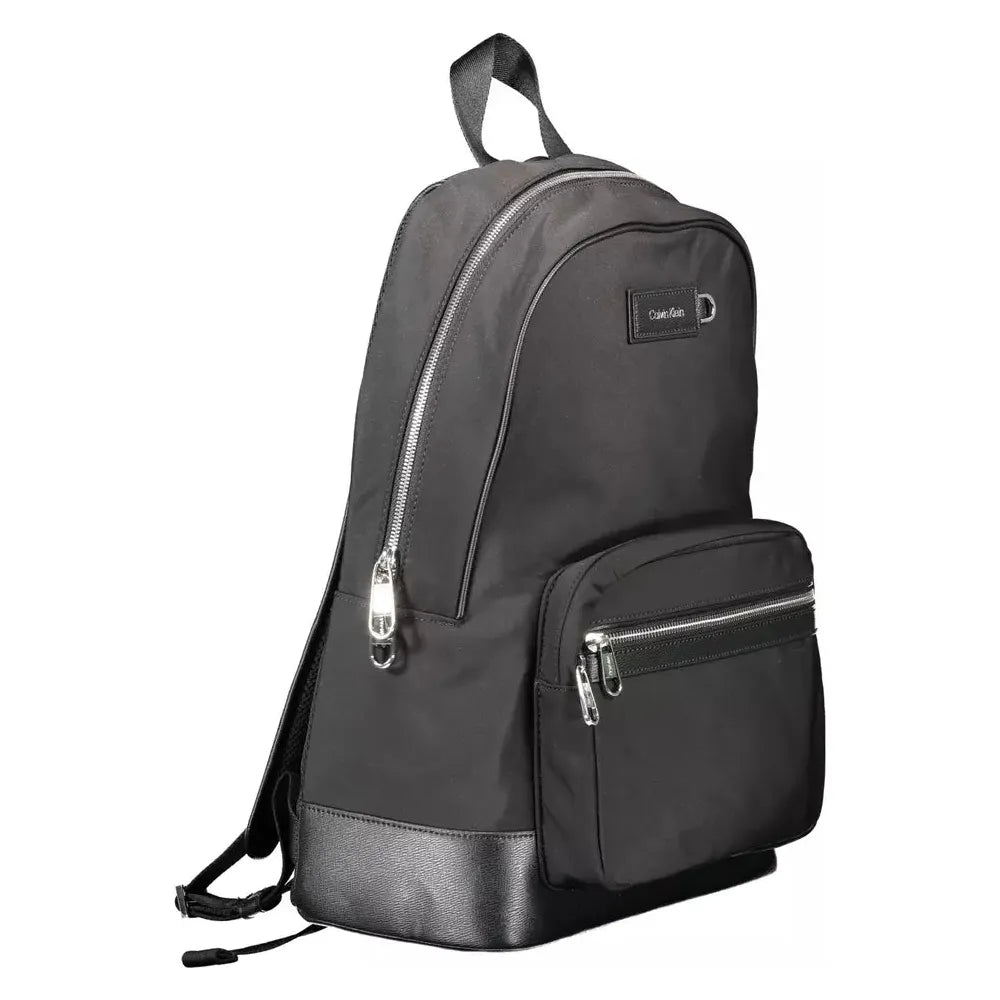 Front view with bag zipped and handles upright.