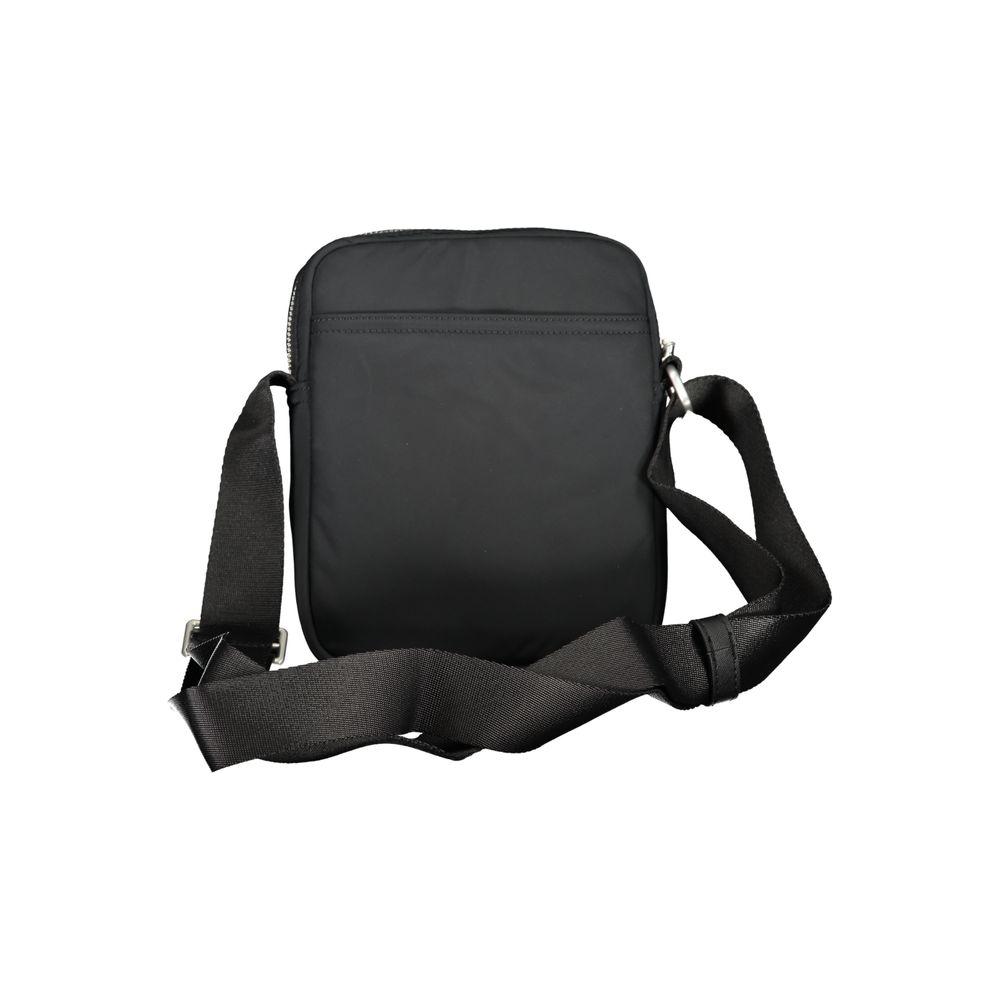 Front view with bag zipped and handles upright.