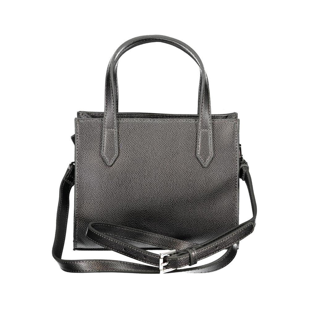 Front view with bag zipped and handles upright.