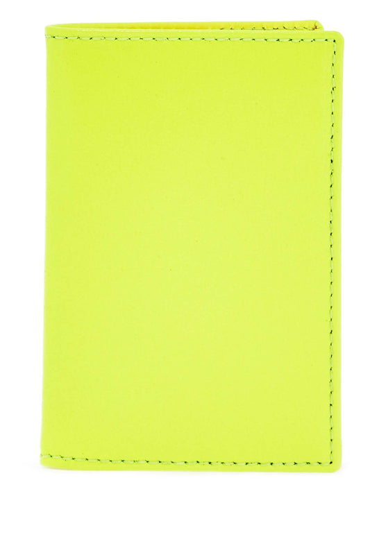 Comme Des Garcons Wallet compact wallet in fluorescent yellow goat leather Wallets Comme Des Garcons Wallet